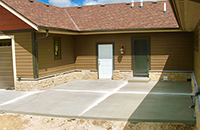 concrete step, sidewalk, and retaining wall